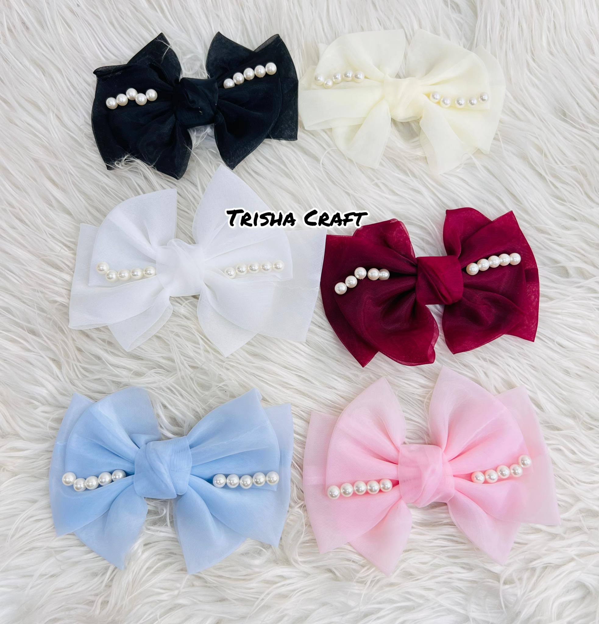 551849302_122155440662614849_8218668200143160956_n Pearl Setting Bow Clip - Image 1